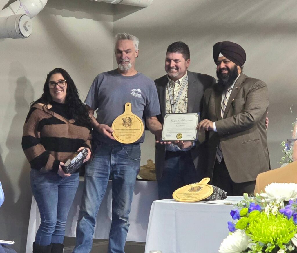 Courtney and Jim Receive Award - BREAD Award Winners - Rogers Kitchens